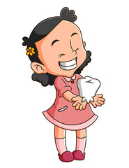 The cute girl is showing the clean teeth and holding the tooth model
