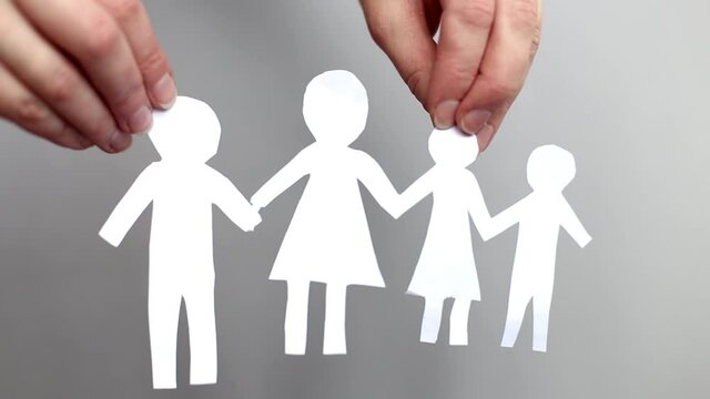 Paper chain cut family on gray background.family reunion concept.