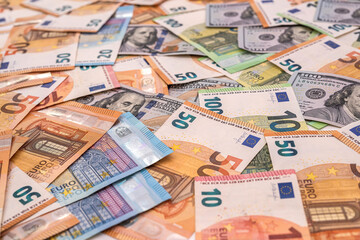 Obraz na płótnie Canvas us dollar and euro bills as two leading world currencies