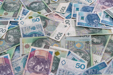 pile of polish banknotes zloty as financial background