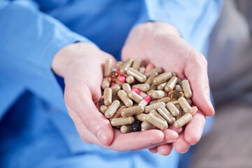 different pills in the hands