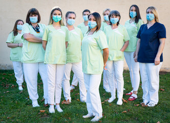 Nursing female team together portrait out side . high quality photo 