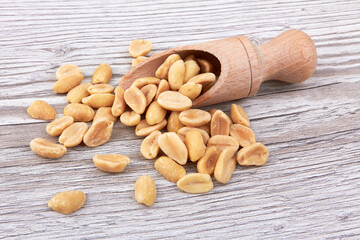 Salted peanuts with spoon