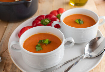 Bell pepper soup in white soup cups