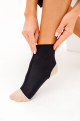 Support for foot injury, ankle brace on white background