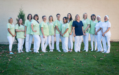Nursing female team together portrait out side . high quality photo 