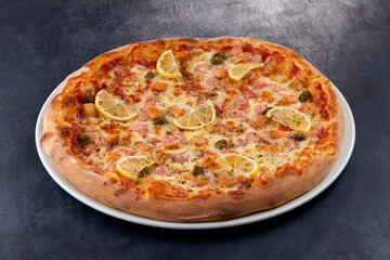 fresh pizza on the white plate