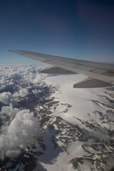 Obraz premium A beautiful viewa from abowe from the airplane window over the Norway. Travel photography of Northern Europe.