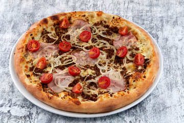 fresh pizza on the white plate