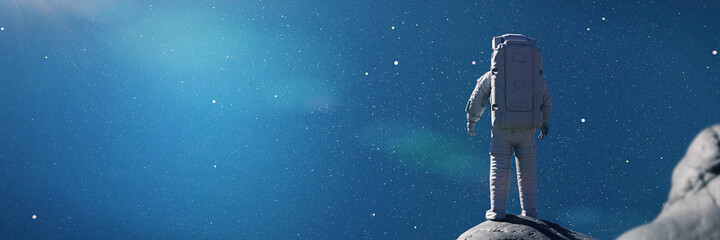 astronaut looking at the sky, background banner  © dottedyeti