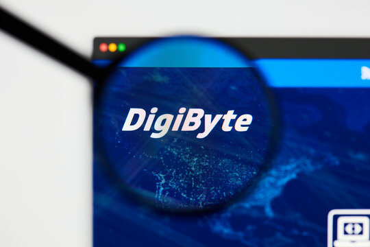 Milan, Italy - January 11, 2022: digibyte - DGB website's hp.  digibyte, DGB coin logo visible through a loope. Defi, ntf, cryptocurrency concepts illustrative editorial.