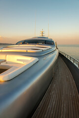 Beautiful sea view from the starboard side of a luxury yacht at sunset / sunrise - vertical orientation
