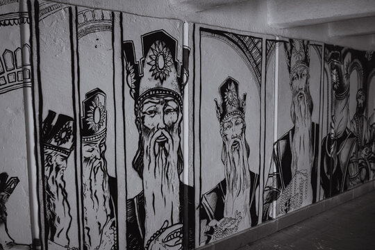 Tbilisi, Georgia - December 27, 2021: Large scale drawings on the walls of the underpass - street art