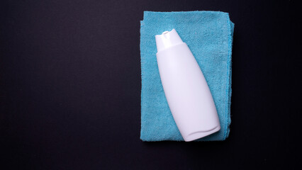 hand cream packaging on black background