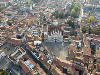 Fototapeta na wymiar Aerial view of facade of the ancient Duomo in Monza (Monza Cathedral). Drone photography of the main square with church in Monza in north Italy, Brianza, Lombardia.