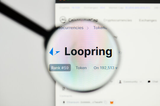 Milan, Italy - January 11, 2022: loopring - LRC website's hp.  loopring, LRC coin logo visible through a loope. Defi, ntf, cryptocurrency concepts illustrative editorial.