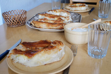 Table setting with pie on a table closeup