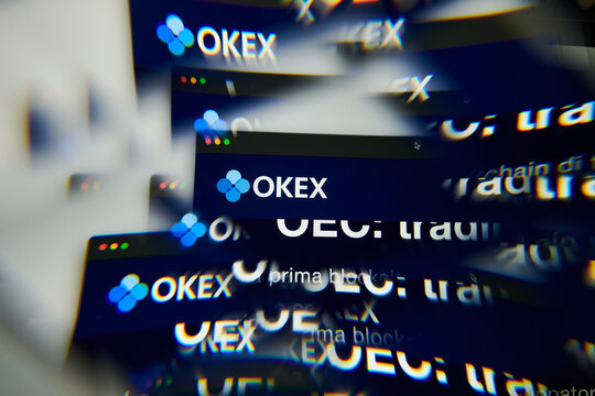 Milan, Italy - January 11, 2022: oec token - OKT logo on laptop screen seen through an optical prism. Dynamic and unique image form oec token, OKT coin website. Illustrative editorial.
