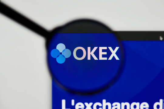 Milan, Italy - January 11, 2022: okb - OKB website's hp.  okb, OKB coin logo visible through a loope. Defi, ntf, cryptocurrency concepts illustrative editorial.