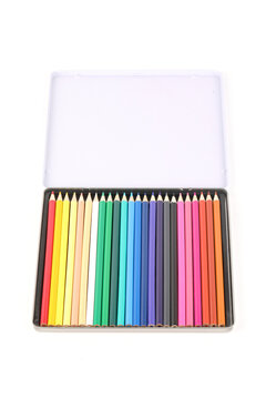 A close-up of box of new colorful crayons isolated on a white background
