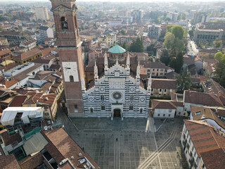 Fototapeta premium Aerial view of facade of the ancient Duomo in Monza (Monza Cathedral). Drone photography of the main square with church in Monza in north Italy, Brianza, Lombardia.