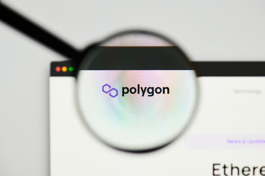 Milan, Italy - January 11, 2022: polygon - MATIC website's hp.  polygon, MATIC coin logo visible through a loope. Defi, ntf, cryptocurrency concepts illustrative editorial.