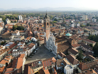 Fototapeta premium Aerial view of facade of the ancient Duomo in Monza (Monza Cathedral). Drone photography of the main square with church in Monza in north Italy, Brianza, Lombardia.