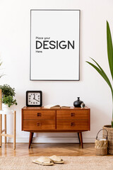 Stylish and retro composition of living room with design wooden retro commode, clock, a lot of plants and elegant accessories. Modern home decor. Template. Mock up poster frame on the wall.
