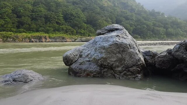 Morning view at GOA beach located in Rishikesh Uttarakhand near Laxman Jhula, Clean view of Ganga river at Rishikesh during early morning time, World famous GANGA river full view