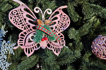 Christmas tree decorations and toys for fir trees covered with snow and ice. Close-up. Happy New...