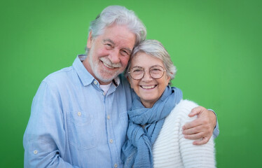 Beautiful happy mature old caucasian 70s senior couple white haired hugging with love and...