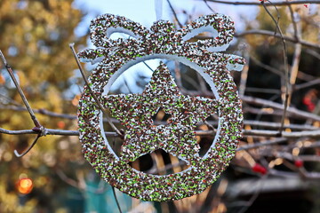 Christmas tree decorations and toys for fir trees covered with snow and ice. Close-up. Happy New...