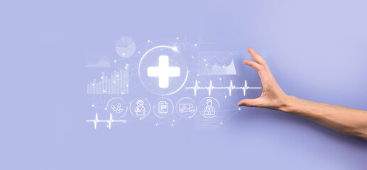 Businessman hold virtual plus medical network connection icons. Covid-19 pandemic develop people awareness and spread attention on their healthcare.Doctor,document,medicine,ambulance,patient icon.