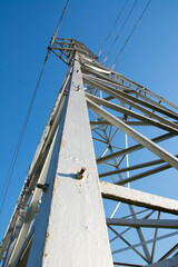 Close-up power station, high voltage power lines. High voltage power transmission tower. 