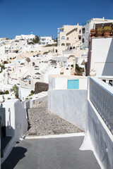 Fototapeta premium White villages on the clifftops of the caldera of Santorini