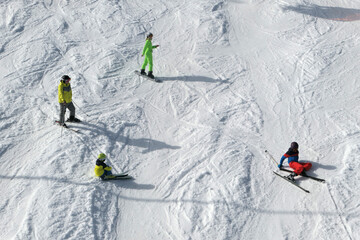 Skiers skiing at the ski slope in popular winter resort Kotelnica Bialczanska.