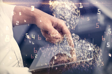 Double exposure of man's hands holding and using a digital device and tech theme hologram drawing. Technology concept.