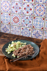 Boiled buckwheat and cucumbers with olive oil and pine nuts