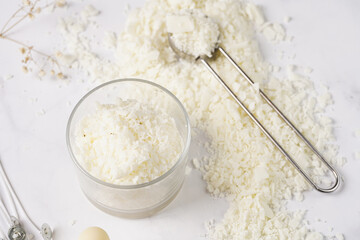 Tools and supply for candle-making: wicks, soy and coconut wax, gold foil, colors and aroma oils, bubble candle