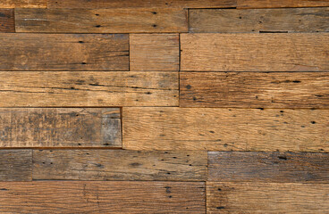 Old brown rustic wood wall paneling. hardwood floor texture. wooden timber background.