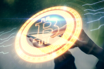 Double exposure of blockchain business sketch hologram and woman holding and using a mobile device.
