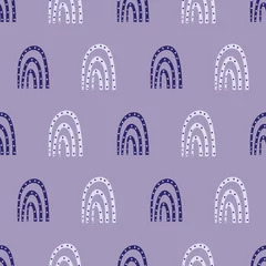 Wallpaper murals Rainbow Vector dotted rainbow childish seamless pattern background. Periwinkle purple backdrop with hand drawn rainbows and dots. Geometric curved shapes weather symbol design. Fun repeat for kids, summer