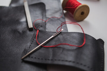 Leather. Sewing a wallet. Leather work. Tools for sewing bags, wallets, clutches. Sewing products...