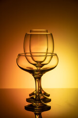 Glassware of different sizes against colorful background