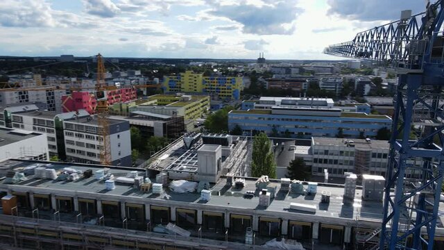 tower crane, blue, Aerial drone in 4k, suburban city background, germany, counterweight, urban