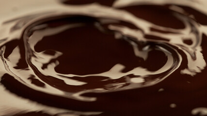 Detail of splashing melted chocolate.
