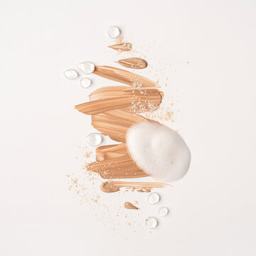 Beauty, skincare products setting. Beige cosmetic cream smear isolated on white background. White beauty foam, powder