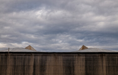 Plastic greenhouses against cloudy sky in Almeria, Spain