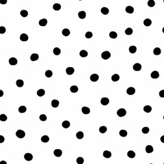 Seamless neutral polka dots pattern. Black hand-drawn circles isolated on white background. Abstract Random points ornament. Vector illustration for wallpaper, fabric, print, wrapping paper, textile