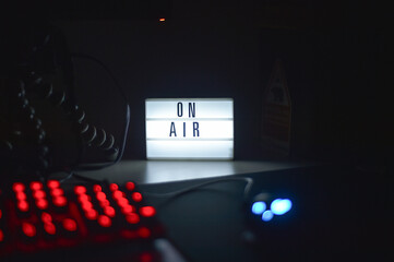 On air phrase written on a customizable light panel